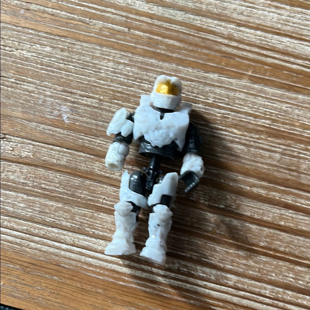 White and Black Action Figure with Gold Visor